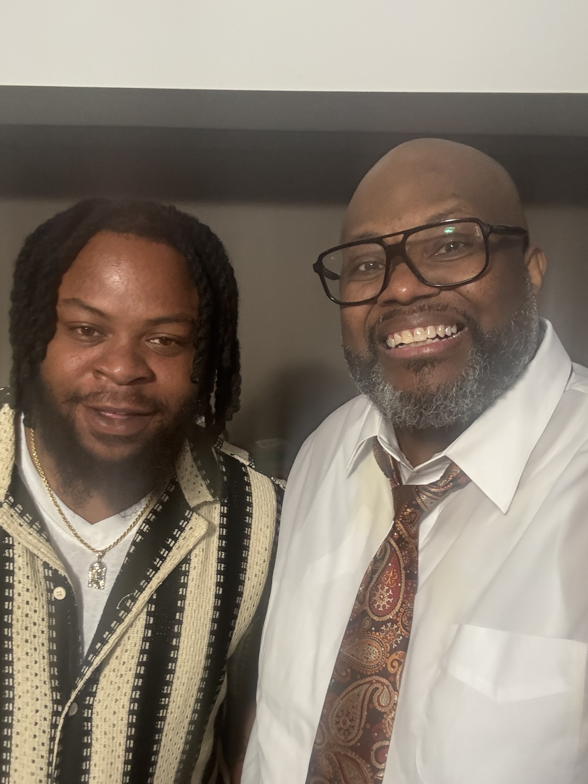 Bishop Aubrey White sharing fellowship with a guest