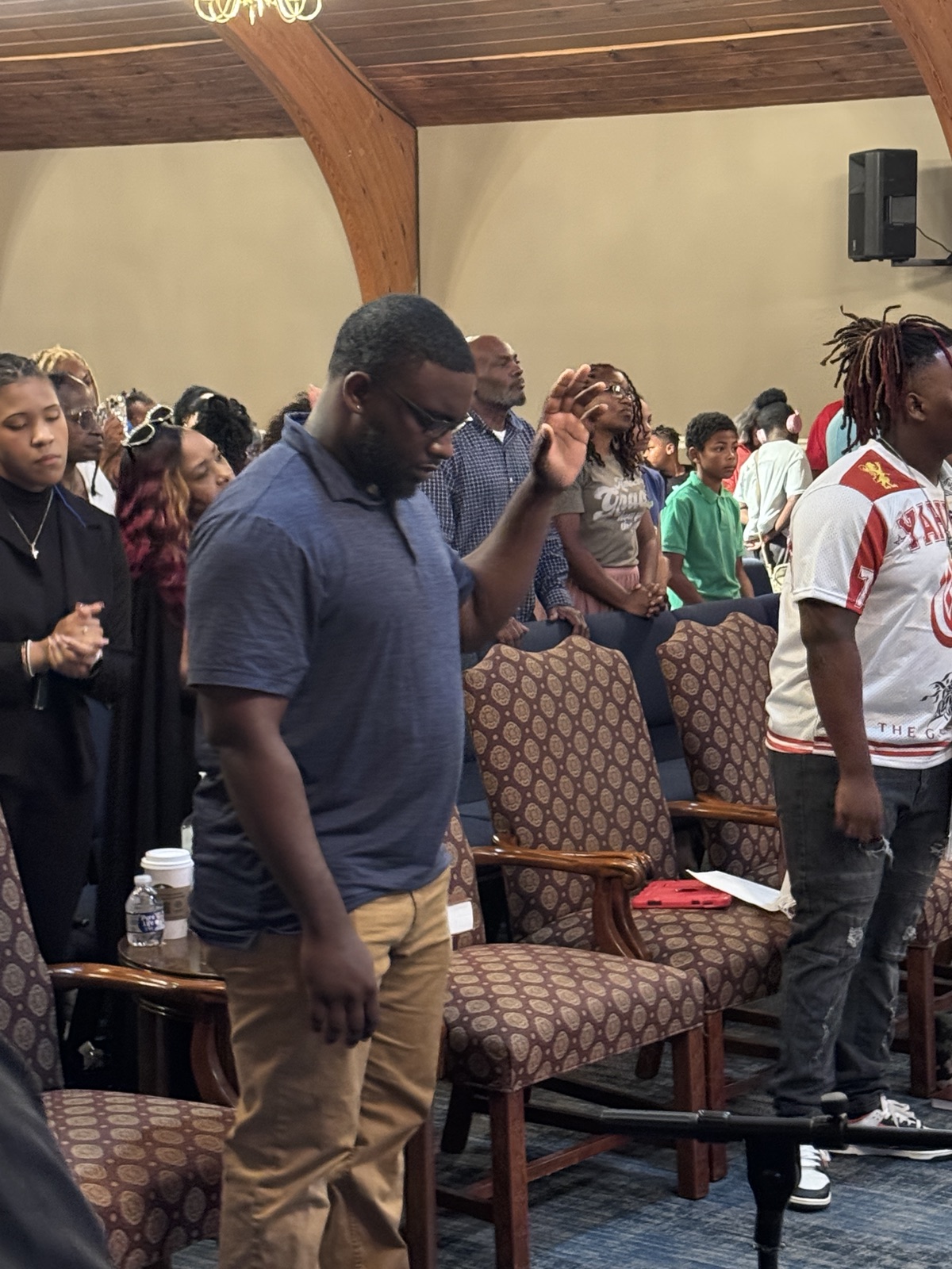 The Victory Life congregation worshiping together